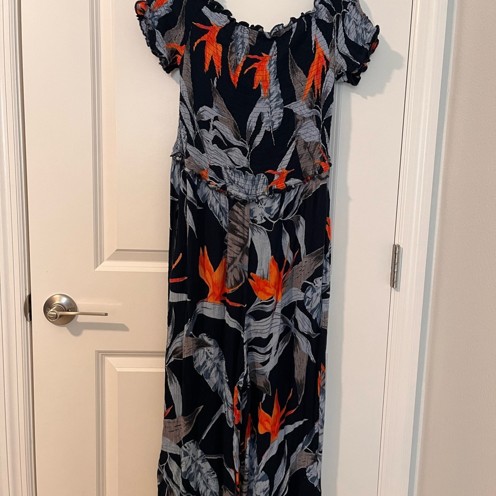Comfy Patrons of Peace Black and Orange Floral Jumpsuit